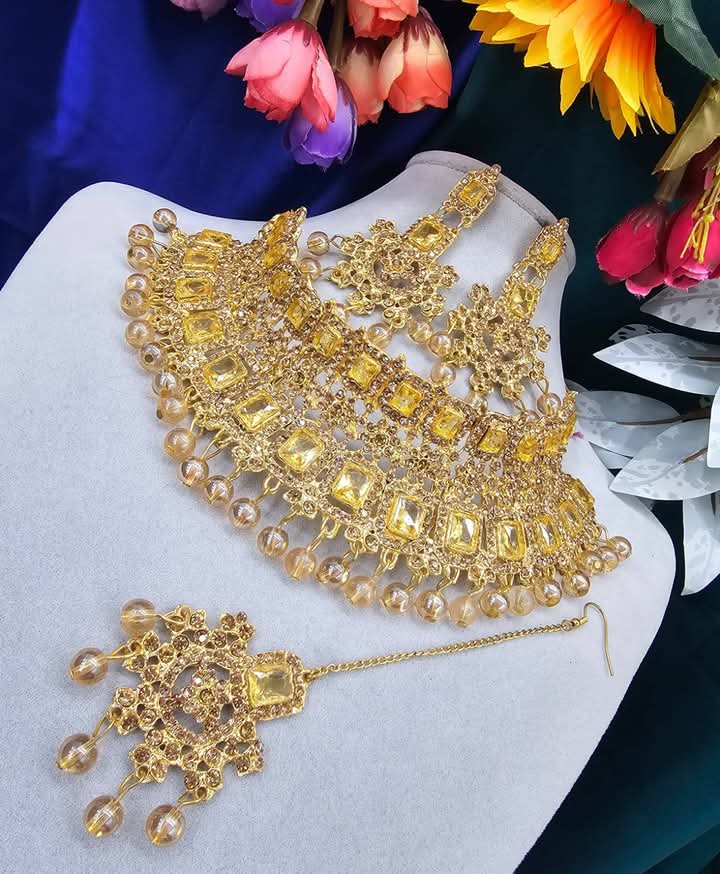 Radiant Yellow Kundan Bridal Jewelry Set – Gold-Plated Statement Choker, Drop Earrings, and Maang Tikka with Amber Stone Accents