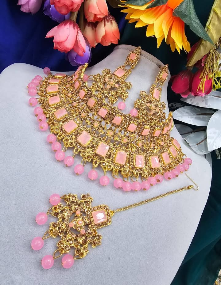 Elegant Peach-Pink Kundan Bridal Jewelry Set – Gold-Plated Statement Choker, Matching Earrings, and Maang Tikka with Rose Stone Embellishments